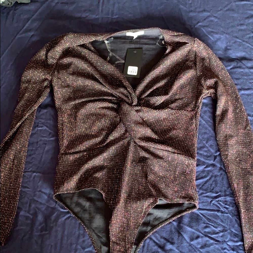 Large Charlotte Russe sparkly bodysuit. Never worn